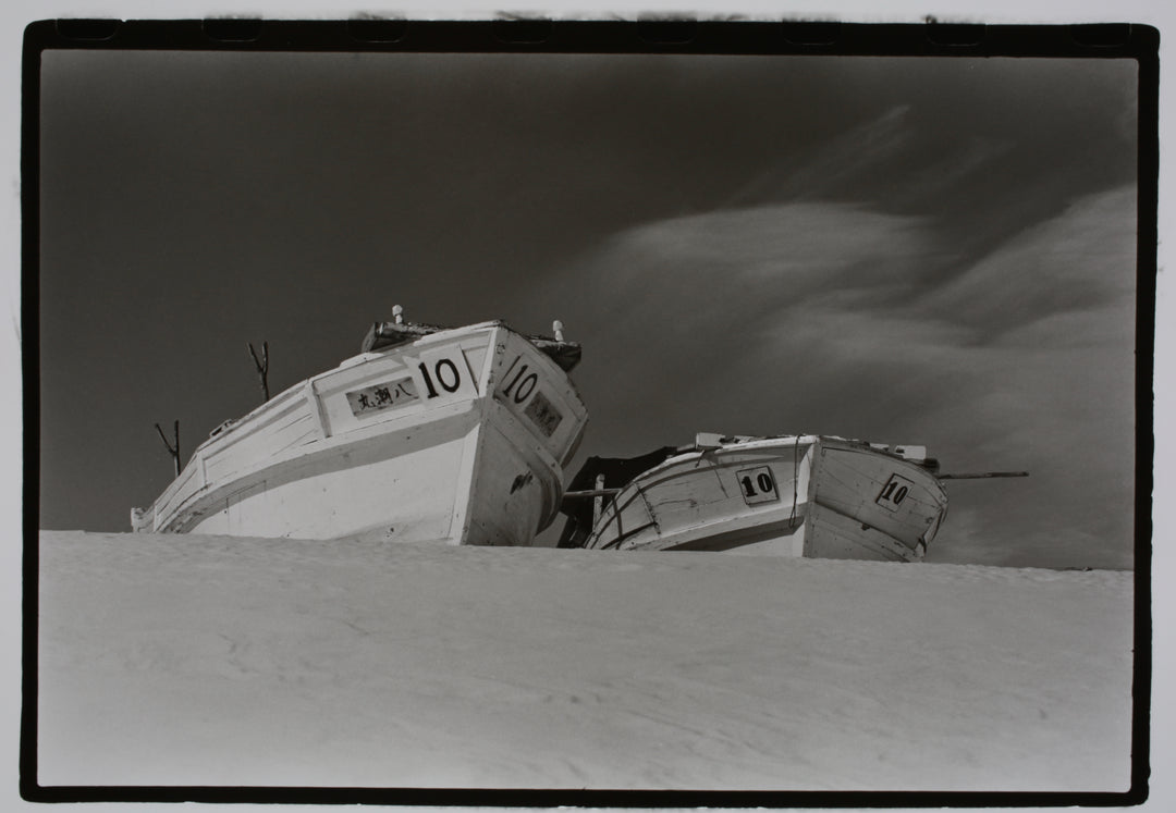 Two Snowy Boats